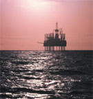 A natural gas platform at sunset